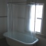 clawfoot tub with shower ring