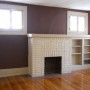 decorative fireplace and shelves in living room