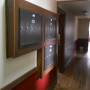 first floor hallway mailboxes across from side entry door