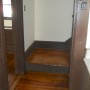 landing and steps to second floor and basement