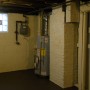 Gas hot water heater tank, and clothes shute