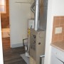 each apartment has separate gas hot forced air furnace heater and gas hot water tank heater