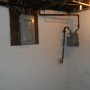 Electric service panel box and gas meter in basement