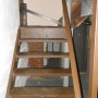 basement stairway looking up towards landing with side door to driveway