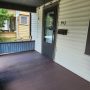front entry door into living room from front porch