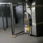 gas forced air heater , gas hot water heater tank in basement
