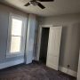 view into south bedroom from living room doorway