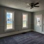 view of front porch doorway through living room