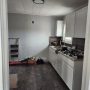 view into kitchen from bedroom doorway